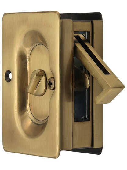 Premium Quality Mid-Century Pocket Door Lock Set In Antique Brass.